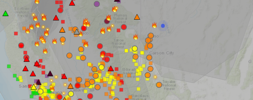 a screen shot of a map from a website called fire and smoke map. the image is covered in various symbols indicating fires and big swaths of gray indicating smoke